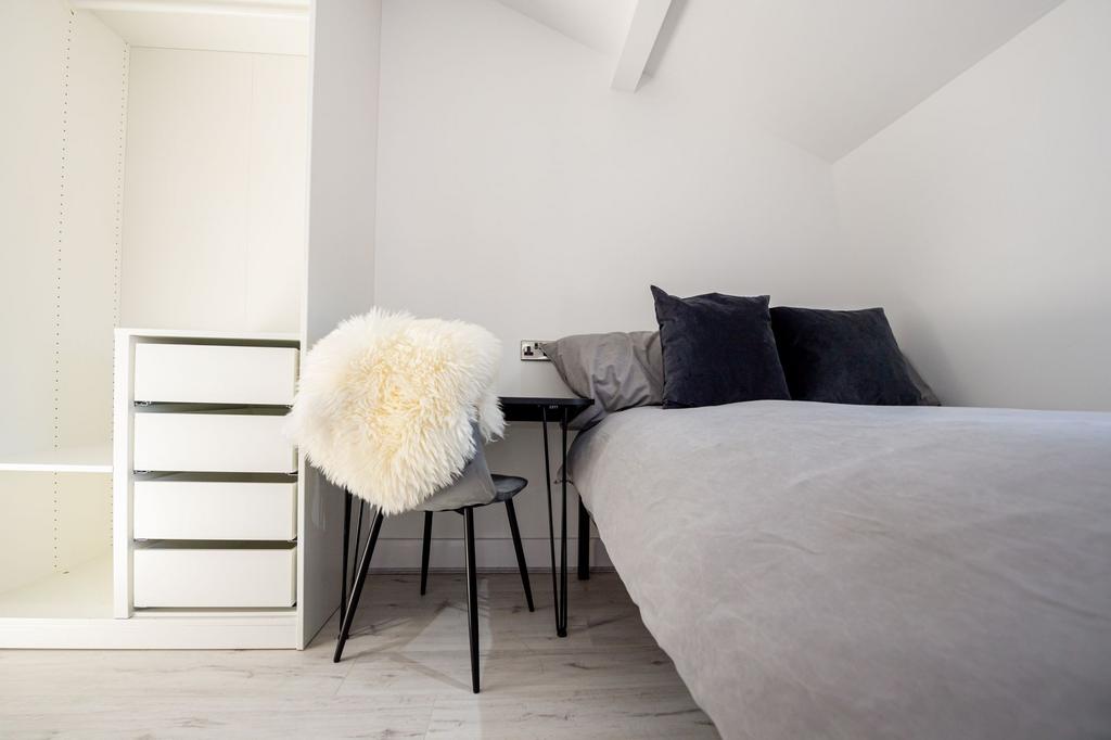 A spacious, beautifully presented master bedroo...