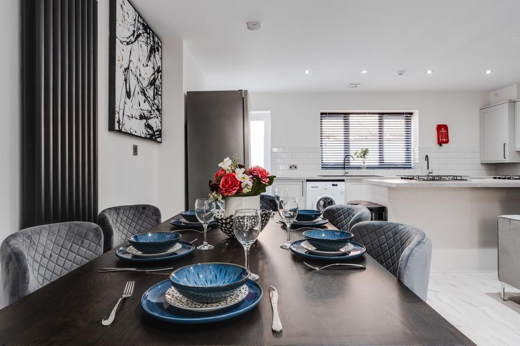 A stylish and spacious living room featuring a ...