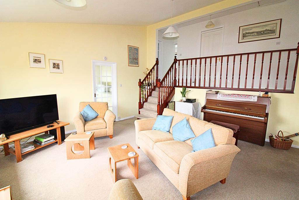 Living room looking at stairs