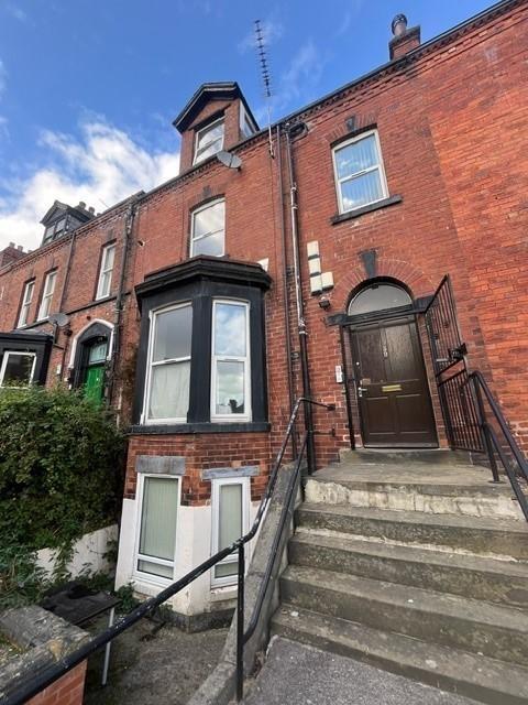 Attractive red-brick terraced property with bay...