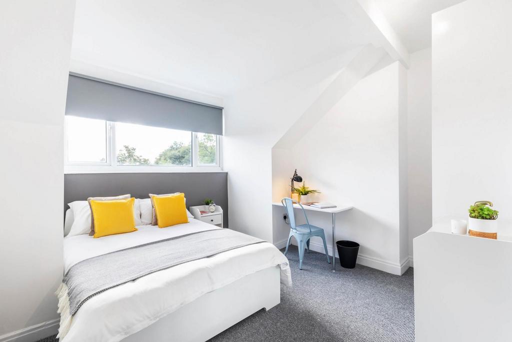 Bright, well-presented bedroom with a comfortab...
