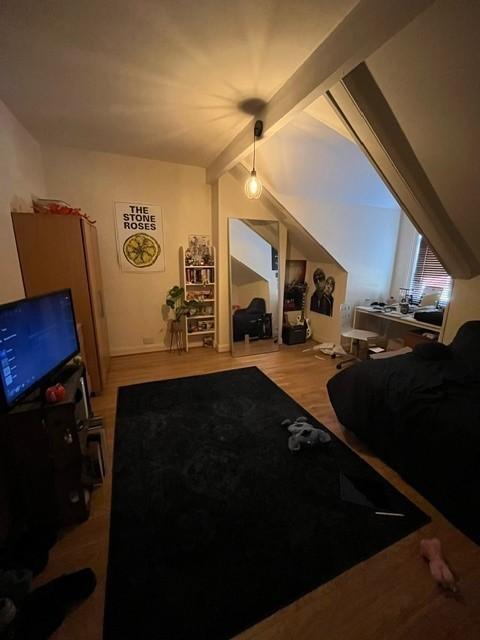 Well-presented double bedroom with sloped ceili...