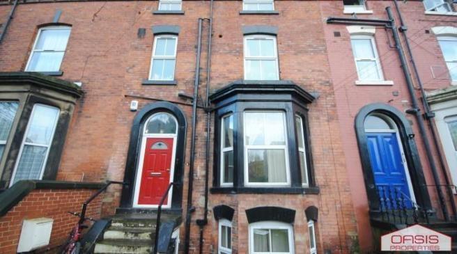 Attractive red-brick terraced property with bay...
