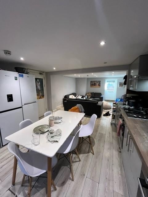Open-plan kitchen and dining area with a modern...
