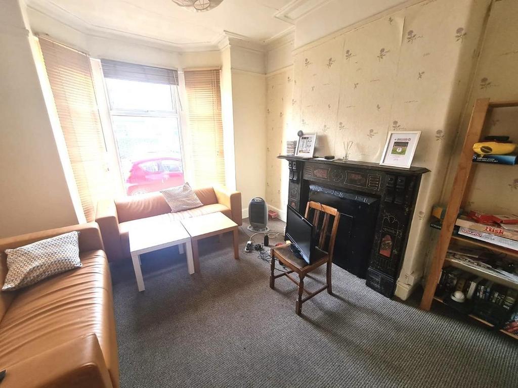 Bright front reception room with a bay window l...