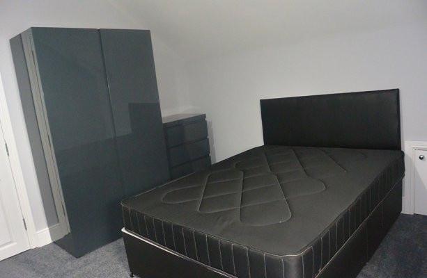 Well-presented double bedroom featuring a moder...