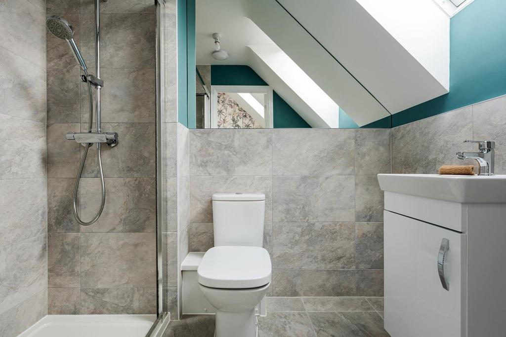 Bedroom 1 boasts an en-suite shower room