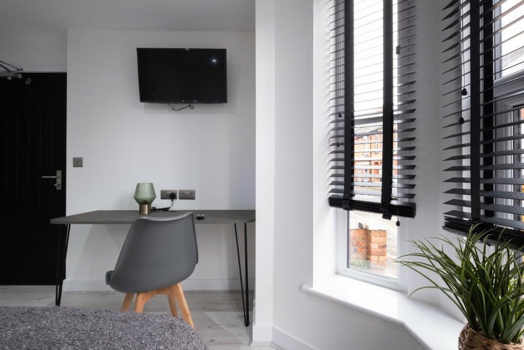 A modern and clean small toilet area featuring ...