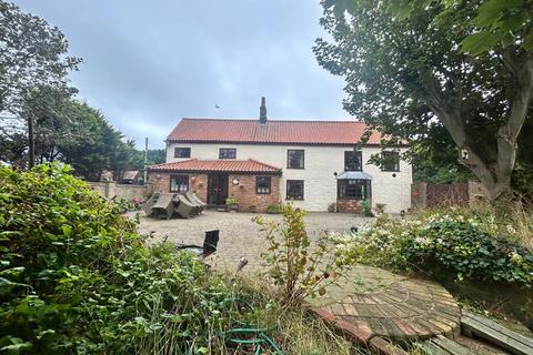 undefined, Waxholme