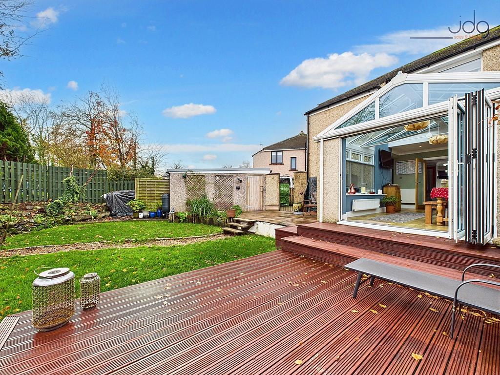 Bi-folding doors opening out to the spacious...