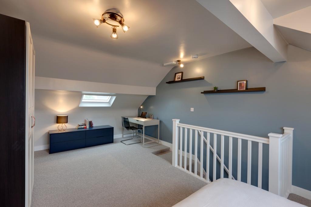 Bright, contemporary attic master bedroom with ...
