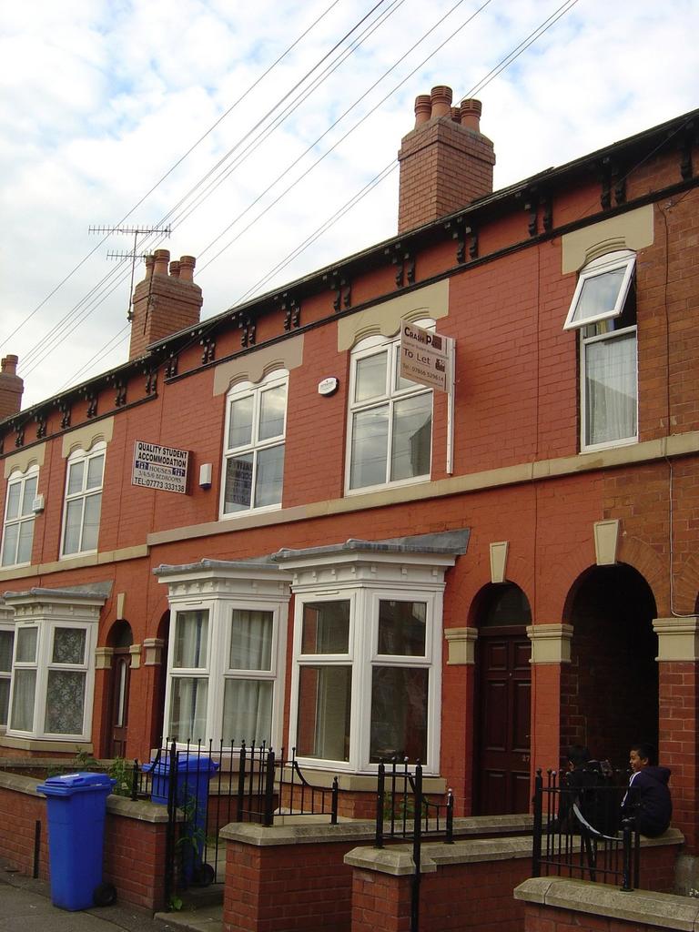 Exterior view of a charming terraced house with...