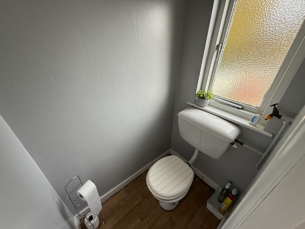 Cloak Room off