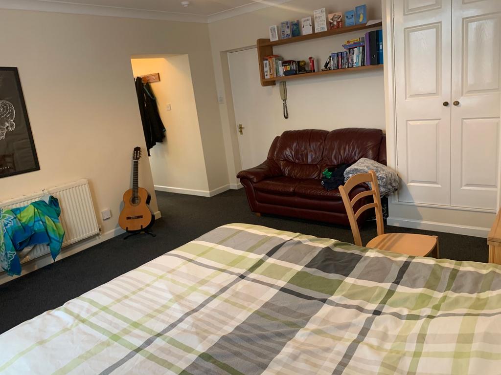 Well-presented master bedroom with a double bed...