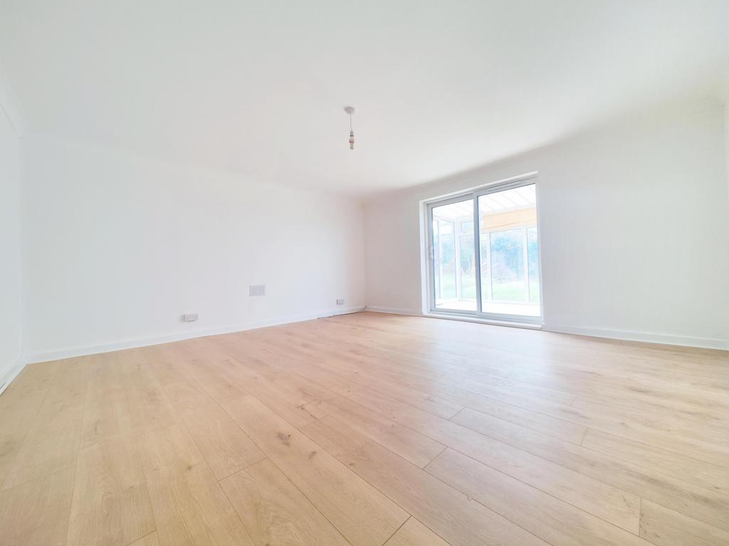 Large living room with conservatory