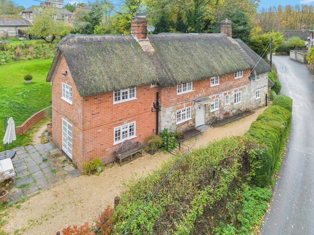 Cottage On The Bank