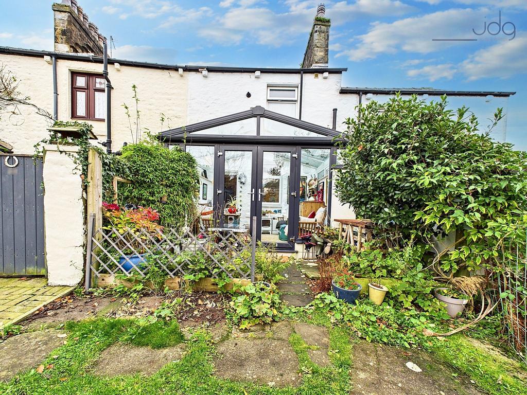 Rear of the property, leading to a separate garden
