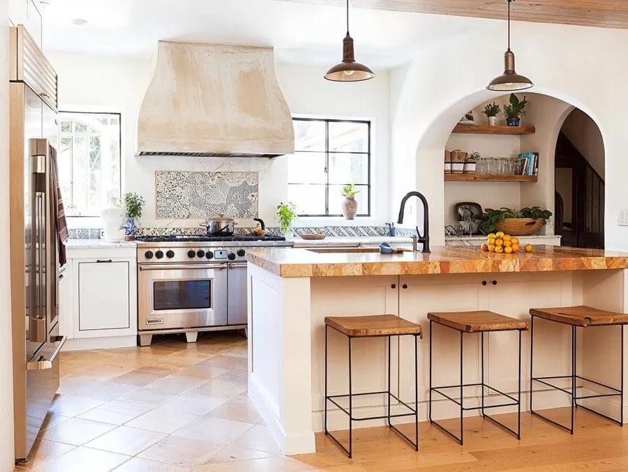 Bright and inviting kitchen featuring a spaciou...
