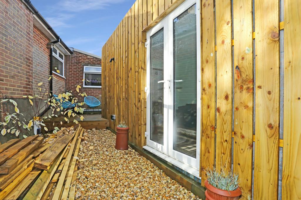 Outbuilding & Decked Area