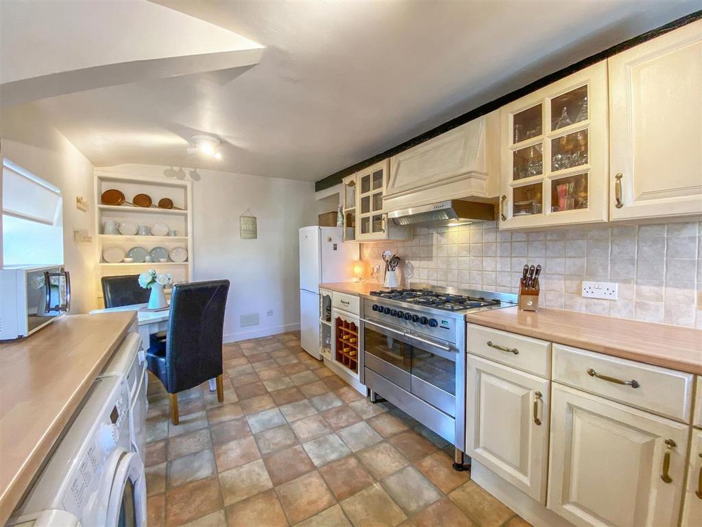 The kitchen has space to casually dine