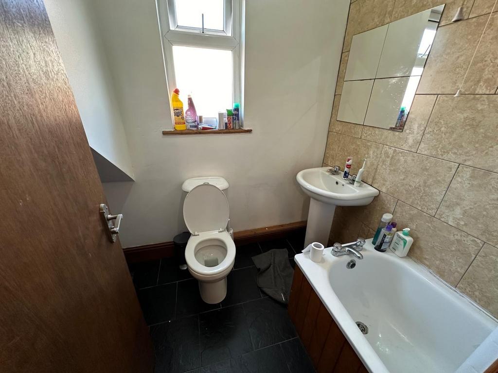 A clean and well-maintained bathroom featuring ...