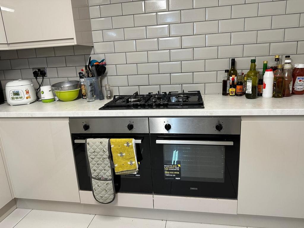 A modern, well-maintained kitchen featuring a s...