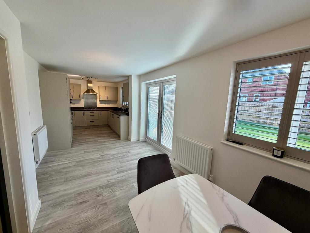 Dining Area into Kitchen