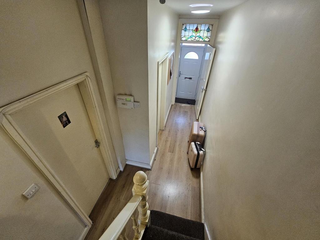 Bright, well-maintained entrance hallway with w...