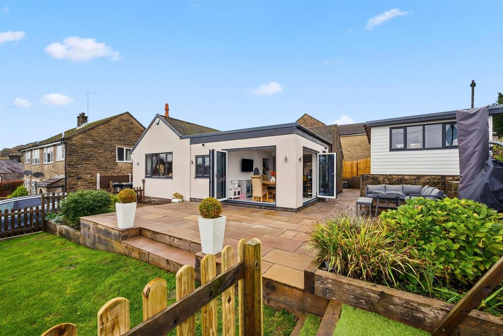 Front of the home and bifolds open.jpg