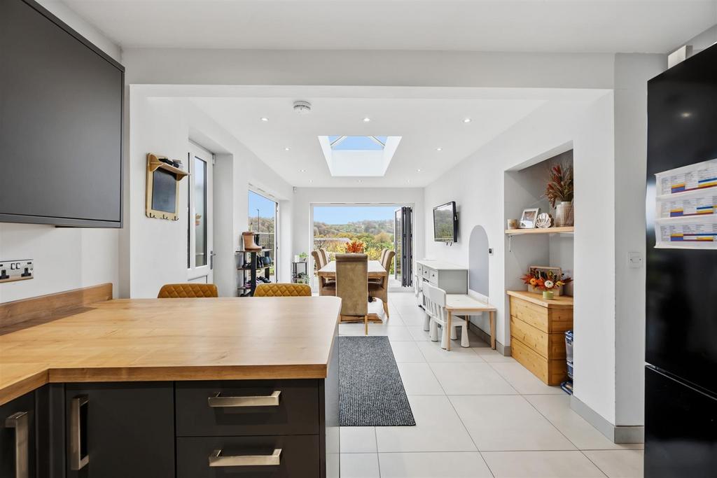 Breakfast bar to dining area and view.jpg