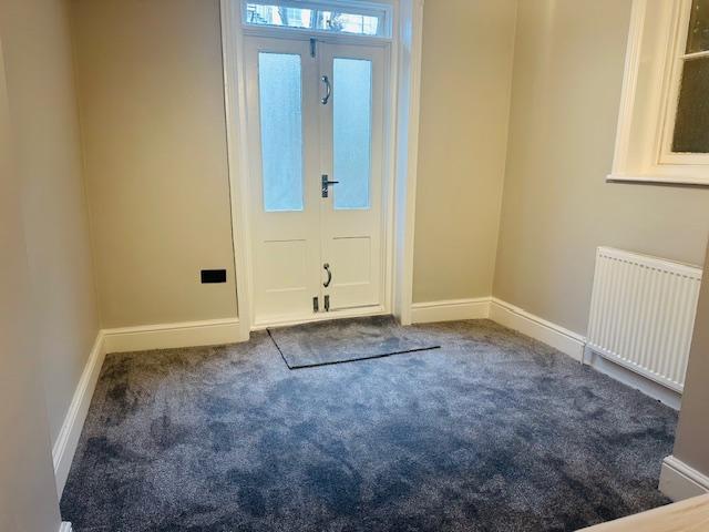 Bedroom to rear door and the garden