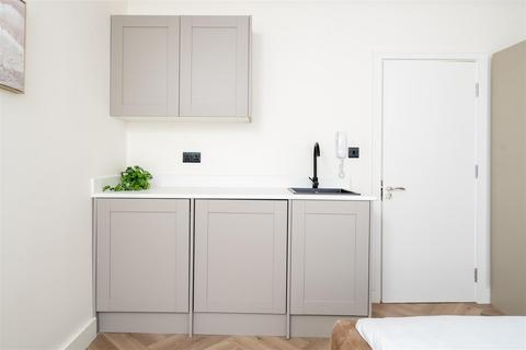 undefined, Runnymede Crescent, London