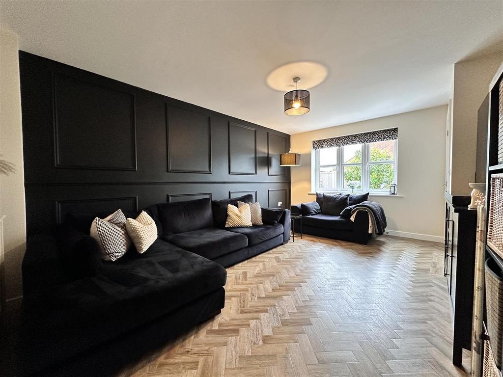 Generous Living Room With Feature Wall Paneling 23
