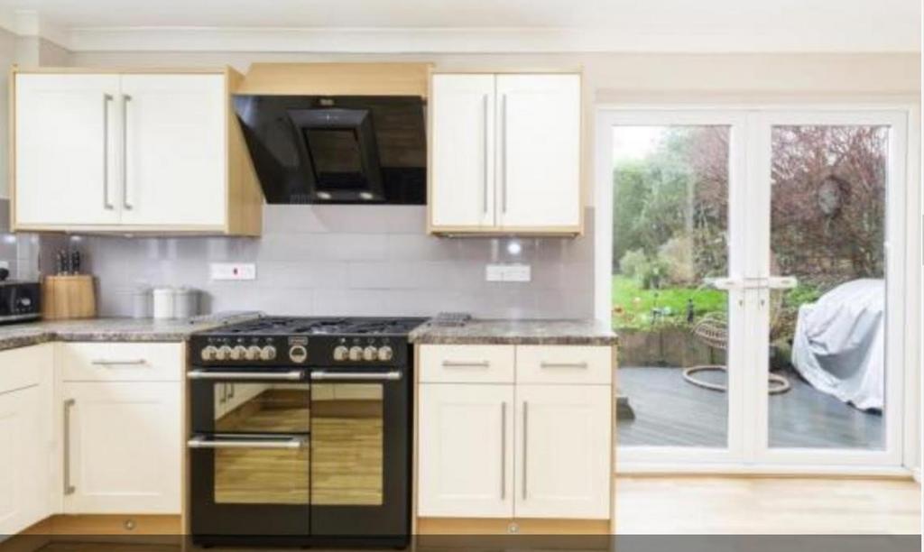 A modern and tidy kitchen featuring a stylish r...