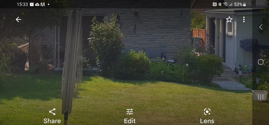 A beautifully maintained garden area showcasing...