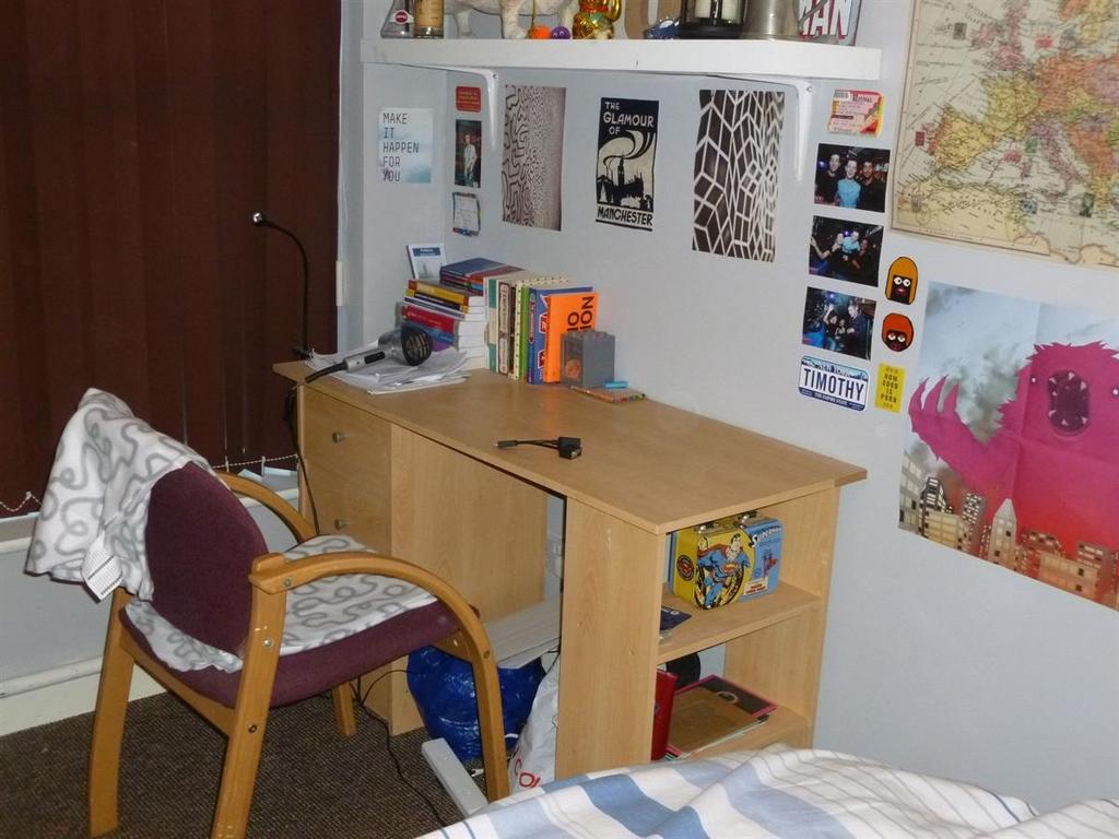 Cozy bedroom corner with a practical study desk...