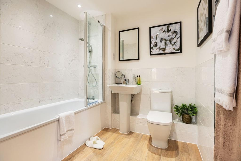 Family bathroom with bath shower