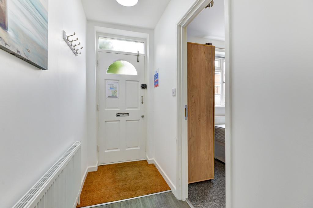 A welcoming view of the front exterior of a pro...