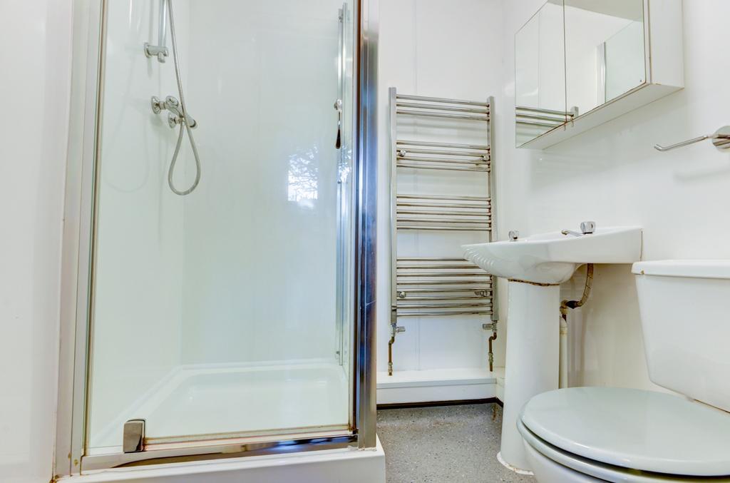 A bright and clean bathroom featuring a modern ...