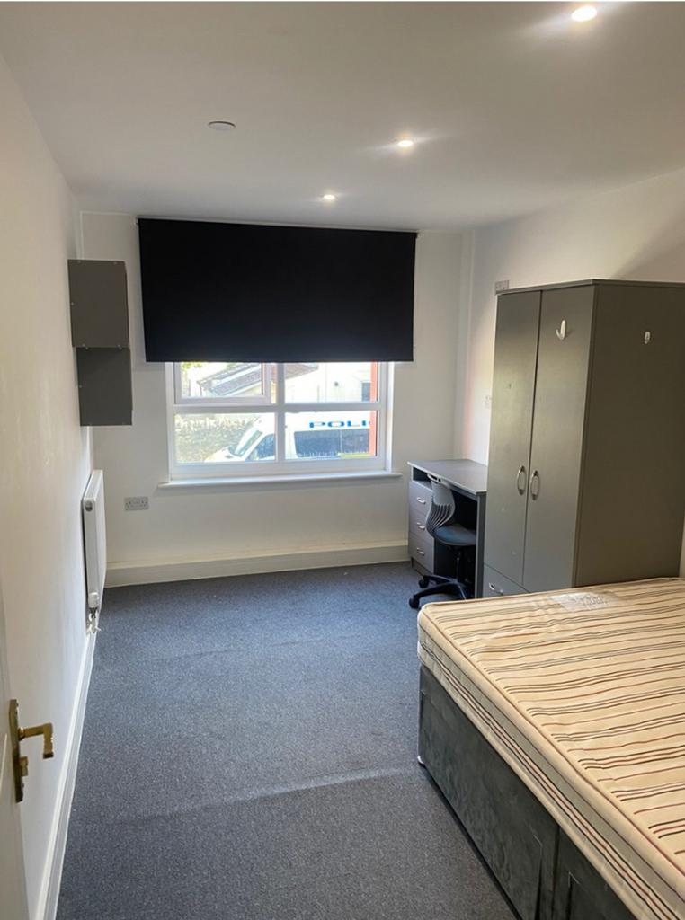 A spacious and bright double bedroom, perfect f...