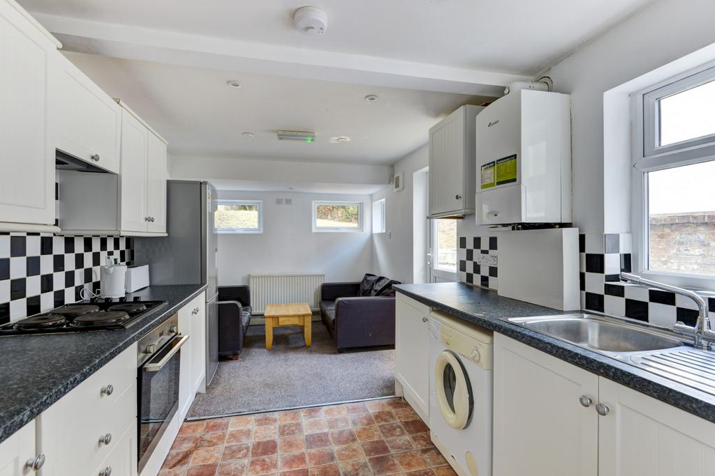 Bright and spacious open-plan living area with ...