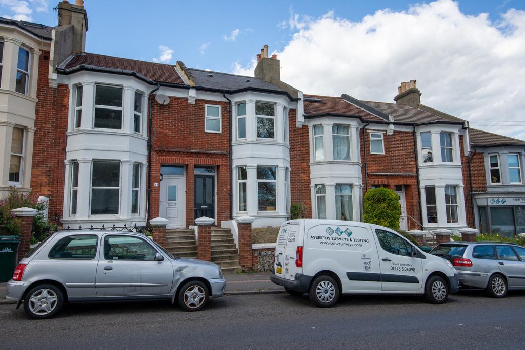 A charming street view of a traditional, terrac...