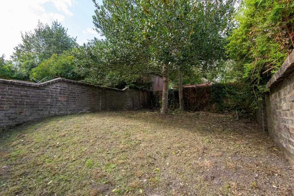Exterior view of a well-maintained garden enclo...