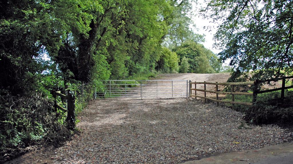 Gated access off Newbarn Lane.