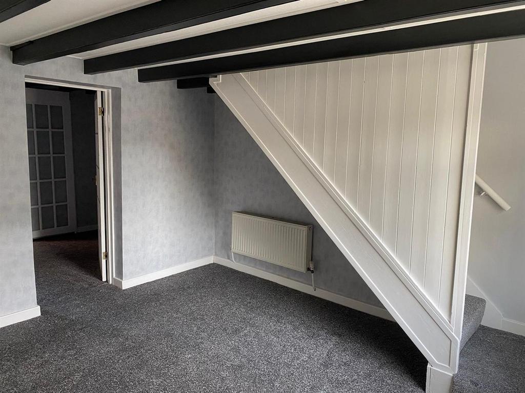 Under stair in Lounge