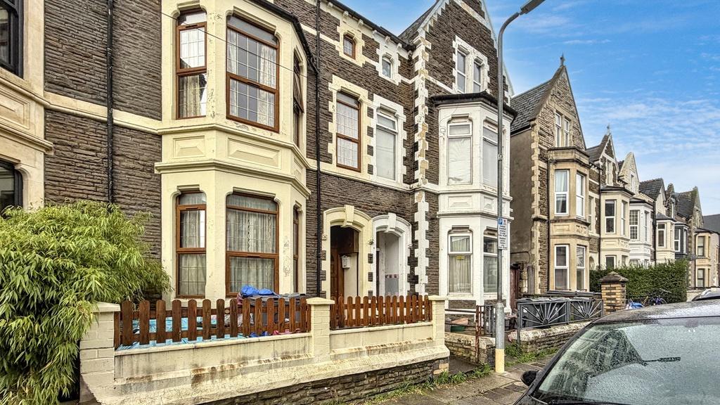 Attractive row of period terraced homes with de...