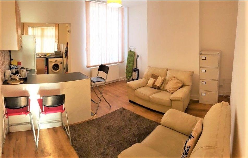 Bright, neatly presented living area with comfy...