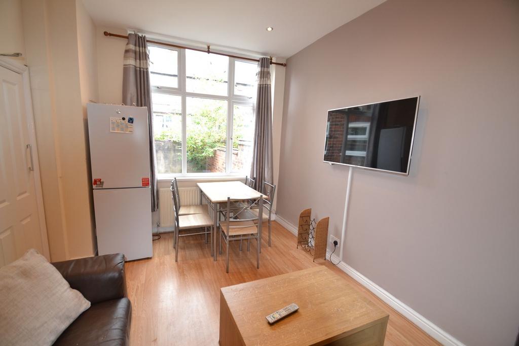 Bright and welcoming living room featuring a la...