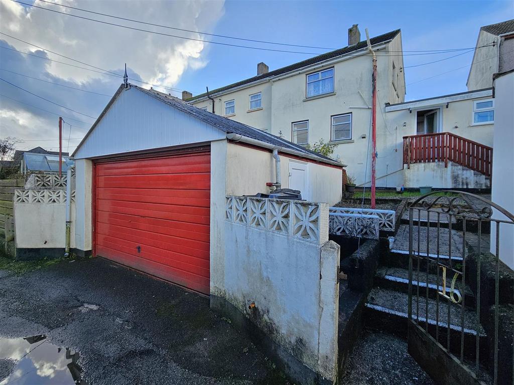 Rear of the property, parking, garage.jpg