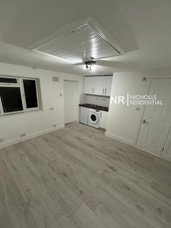 undefined, 110 High Street Colliers Wood, London, Greater London. SW19 2BW